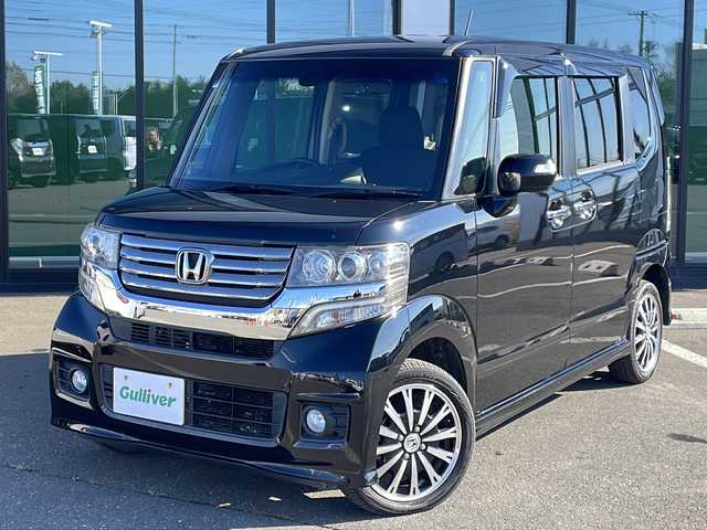 ホンダ Ｎ ＢＯＸ カスタム ターボ SSパッケージ 道東・釧路十勝 2015(平27)年 7.8万km スマートブラック ・４WD/・ターボ/・社外ＳＤメモリナビ/（FM AM DVD CD SD フルセグ Bluetooth）/・バックカメラ/・パドルシフト/・オートライト/・ETC/・衝突軽減システム（CTBA）/・前席シートヒーター/・ヒーテッドドアミラー/・アイドリングストップ/・横滑り防止装置/・スマートキー/・プッシュスタート/・純正ロアマット/・社外前方ドライブレコーダー/・純正15インチアルミホイール