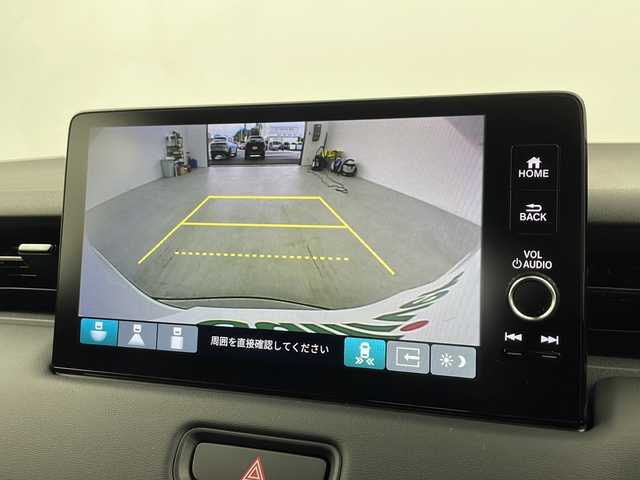 ホンダ ヴェゼル ハイブリッド e:HEV Z 愛知県 2025(令7)年 0.1千km プラチナホワイトパール /R7年10月登録済未使用車//純正HondaCONNECTナビ//フルセグTV/AMFM/Bluetooth/USB//AppleCarPlay/AndroidAuto//ビルトインETC2.0//バックカメラ//HondaSENSING//アダプティブクルーズコントロール//パーキングセンサーシステム//ブラインドスポットモニター//アダプティブドライビングビーム//後退出庫サポート//フルLEDヘッドランプ//オートライト//LEDアクティブコーナリングライト//LEDフォグランプ//フルLEDリアコンビランプ//ハンズフリーパワーテールゲート//プライムスムースコンビシート//前席シートヒーター//革巻きステアリング//ステアリングスイッチ//ステアリングヒーター//パドルシフト式減速セレクター//純正18インチアルミホイール//電子パーキングブレーキ//ブレーキホールド//ヒルディセントコントロール//プッシュスタート//電動格納ミラー//アイドリングストップ//取扱説明書