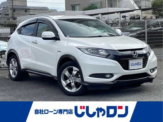 ホンダ ヴェゼル ハイブリッド X 埼玉県 2013(平25)年 13.2万km ホワイトオーキッドパール (株)IDOMが運営する【じしゃロン川越店】の自社ローン専用車両になります。こちらは現金またはオートローンご利用時の価格です。自社ローンご希望の方は別途その旨お申付け下さい/純正ナビ/フルセグ/Ｂｌｕｅｔｏｏｔｈ/Ｂカメラ/衝突軽減ブレーキ/クルーズコントロール/オートホールド/ルーフレール/オートライト/ＬＥＤ/純正１７インチアルミホイール/スマートキー