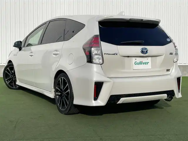トヨタ プリウス α S ツーリングセレクション G’s 香川県 2016(平28)年 7万km ホワイトパールクリスタルシャイン 登録時走行距離：69939km/ディーラー純正8型SDナビ/　CD DVD BT フルセグTV/バックカメラ/グレード専用セミバケッドハーフレザーシート/ビルトインETC/LEDヘッドライト/オートライト/フォグランプ/革巻きステアリング/ステアリングスイッチ/プッシュスタート/スマートキー/スペアキー
