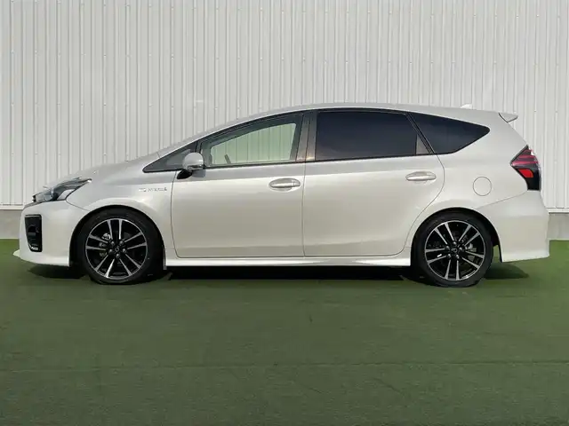 トヨタ プリウス α S ツーリングセレクション G’s 香川県 2016(平28)年 7万km ホワイトパールクリスタルシャイン 登録時走行距離：69939km/ディーラー純正8型SDナビ/　CD DVD BT フルセグTV/バックカメラ/グレード専用セミバケッドハーフレザーシート/ビルトインETC/LEDヘッドライト/オートライト/フォグランプ/革巻きステアリング/ステアリングスイッチ/プッシュスタート/スマートキー/スペアキー