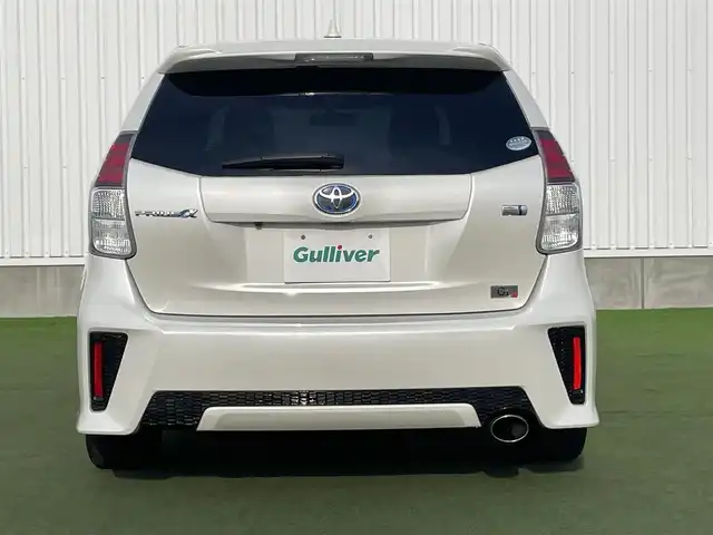 トヨタ プリウス α S ツーリングセレクション G’s 香川県 2016(平28)年 7万km ホワイトパールクリスタルシャイン 登録時走行距離：69939km/ディーラー純正8型SDナビ/　CD DVD BT フルセグTV/バックカメラ/グレード専用セミバケッドハーフレザーシート/ビルトインETC/LEDヘッドライト/オートライト/フォグランプ/革巻きステアリング/ステアリングスイッチ/プッシュスタート/スマートキー/スペアキー