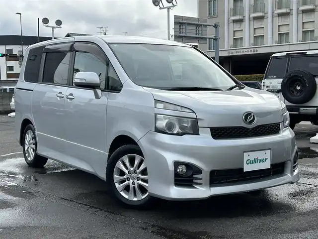 トヨタ ヴォクシー X サイドリフト 静岡県 2012(平24)年 7.7万km シルバーM 社外メモリナビ・フルセグTV/DVD/CD/USB/SD/Bluetooth/バックカメラ/左側パワースライド/純正16インチアルミホイール/HIDライト/ETC/スマートキー2個/プッシュスタート/サイドリフトアップシート/スローパー/取扱説明書