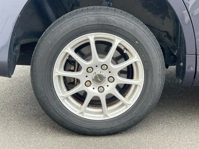 トヨタ ヴォクシー X Lエディション 秋田県 2007(平19)年 17.9万km ダークバイオレットマイカメタリック 社外ナビ/４WD/両側パワスラ/社外アルミ/スマートキー/アイドリングストップ/プッシュスタート/フリップダウンモニター/センターデフロック/MTモード付AT/ETC/純正フロアマット/純正ドアバイザー/オートエアコン/パワーステアリング/パワーウィンドウ/電動格納ウィンカーミラー/保証書/取扱説明書/記録簿