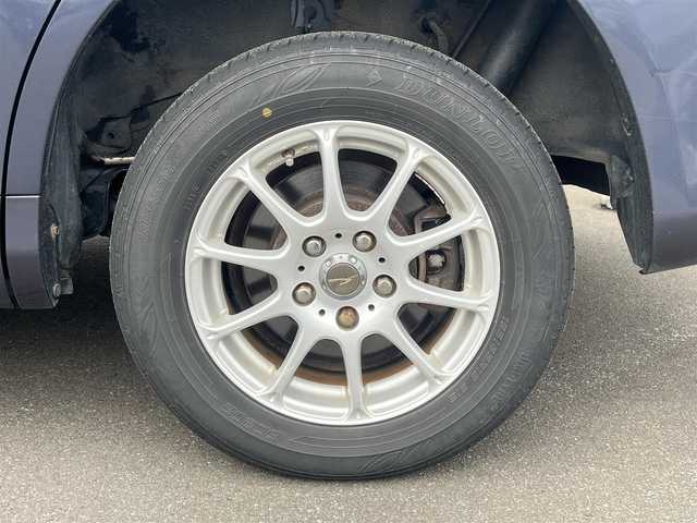 トヨタ ヴォクシー X Lエディション 秋田県 2007(平19)年 17.9万km ダークバイオレットマイカメタリック 社外ナビ/４WD/両側パワスラ/社外アルミ/スマートキー/アイドリングストップ/プッシュスタート/フリップダウンモニター/センターデフロック/MTモード付AT/ETC/純正フロアマット/純正ドアバイザー/オートエアコン/パワーステアリング/パワーウィンドウ/電動格納ウィンカーミラー/保証書/取扱説明書/記録簿