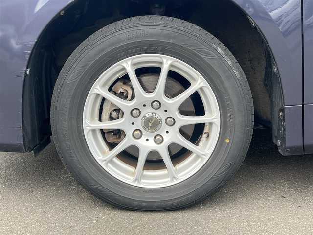 トヨタ ヴォクシー X Lエディション 秋田県 2007(平19)年 17.9万km ダークバイオレットマイカメタリック 社外ナビ/４WD/両側パワスラ/社外アルミ/スマートキー/アイドリングストップ/プッシュスタート/フリップダウンモニター/センターデフロック/MTモード付AT/ETC/純正フロアマット/純正ドアバイザー/オートエアコン/パワーステアリング/パワーウィンドウ/電動格納ウィンカーミラー/保証書/取扱説明書/記録簿