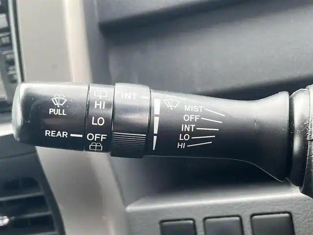 トヨタ ヴォクシー X Lエディション 秋田県 2007(平19)年 17.9万km ダークバイオレットマイカメタリック 社外ナビ/４WD/両側パワスラ/社外アルミ/スマートキー/アイドリングストップ/プッシュスタート/フリップダウンモニター/センターデフロック/MTモード付AT/ETC/純正フロアマット/純正ドアバイザー/オートエアコン/パワーステアリング/パワーウィンドウ/電動格納ウィンカーミラー/保証書/取扱説明書/記録簿
