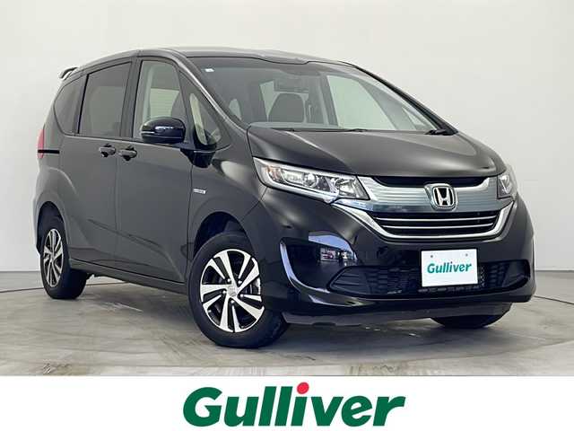 ホンダ フリード＋ ハイブリット G ホンダセンシング 秋田県 2016(平28)年 5.2万km クリスタルブラックパール 4WD/片側パワースライドドア/純正ナビ/　（CD/DVD/TV/Bluetooth）/バックカメラ/クルーズコントロール/ステアリングスイッチ/革巻きハンドル/ビルトインETC/社外ミラー型ドライブレコーダー/横滑り防止装置/前席シートヒーター/ハーフレザーシート/純正フロアマット/純正15インチアルミホイール/LEDヘッドライト/オートライト/スマートキー/スペアキー