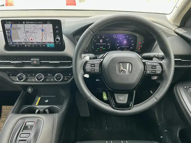 ホンダ ＺＲ－Ｖ ハイブリッド e:HEV Z 大阪府 2023(令5)年 0.8万km プラチナホワイトパール 純正９インチナビ/   フルセグTV/Bluetooth/USB/全方位モニター/衝突軽減ブレーキ/横滑り防止装置/コーナーセンサー/レザーシート/前席シートヒーター/レーダークルーズコントロール/レーンキープアシスト/パドルシフト/電動リアゲート/パワーシート（運転席のみメモリー付き）/ワイヤレス充電/ステアリングヒーター/ダウンヒルアシストコントロール/前後ドライブレコーダー/オートマチックハイビーム/純正18インチアルミホイール/純正フロアマット/プッシュスタート/スマートキー/ＥＴＣ/ＬＥＤ/禁煙車