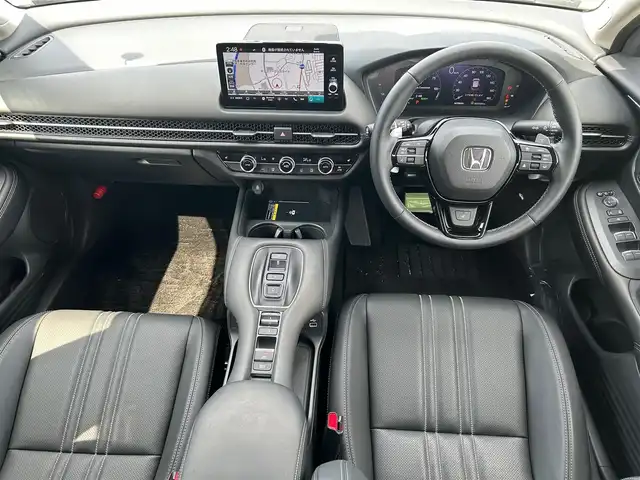 ホンダ ＺＲ－Ｖ ハイブリッド e:HEV Z 大阪府 2023(令5)年 0.8万km プラチナホワイトパール 純正９インチナビ/   フルセグTV/Bluetooth/USB/全方位モニター/衝突軽減ブレーキ/横滑り防止装置/コーナーセンサー/レザーシート/前席シートヒーター/レーダークルーズコントロール/レーンキープアシスト/パドルシフト/電動リアゲート/パワーシート（運転席のみメモリー付き）/ワイヤレス充電/ステアリングヒーター/ダウンヒルアシストコントロール/前後ドライブレコーダー/オートマチックハイビーム/純正18インチアルミホイール/純正フロアマット/プッシュスタート/スマートキー/ＥＴＣ/ＬＥＤ/禁煙車