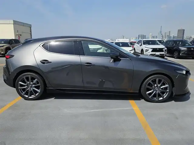 マツダ マツダ３ファストバック XD バーガンディセレクション 島根県 2019(令1)年 7.4万km マシーングレープレミアムM 純正8.8型ナビ/　(AM/FM/CD/DVD)/360度ビューモニター/ビルトインETC/全車速追従機能付レーダークルーズコントロール/パーキングセンサー/i-ACTIVSENSE/・スマートブレーキサポート/・AT誤発進抑制制御/・クルージングトラフィックサポート/・車線逸脱警報システム/・レーンキープアシスト/・前後接近車両検知/・ブラインドスポットモニタリング/・交通標識認識システム/アクティブドライビングディスプレイ/ターボ/アダプティブLEDヘッドランプ/本革巻きステアリング/ステアリングヒーター/パドルシフト/レッドパーフォレーション革シート/前席シートヒーター/運転席ドライビングポジション機能/純正18インチアルミホイール/アドバンストキーレスエントリーシステム/BOSEサウンドシステム/禁煙車