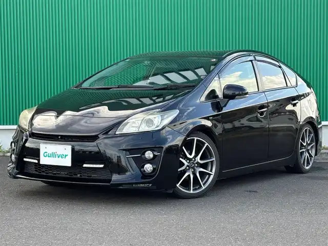 トヨタ プリウス S ツーリングセレ G’s 宮城県 2014(平26)年 7.4万km ブラック 車高調/ガナドールマフラー/社外テールランプ/革調シートカバー/カロッツェリア8インチナビ（AVIC-CL901）/・CD/DVD/・Bluetooth/・フルセグTV/バックカメラ/ビルトインETC/ドライブレコーダー/GPSレーダー探知機/革巻きステアリング/クルーズコントロール/HIDヘッドランプ/フォグランプ/オートライト/スマートキー＆プッシュスタート/電動格納ミラー/純正18インチAW/純正ドアバイザー/純正フロアマット/Wエアバッグ