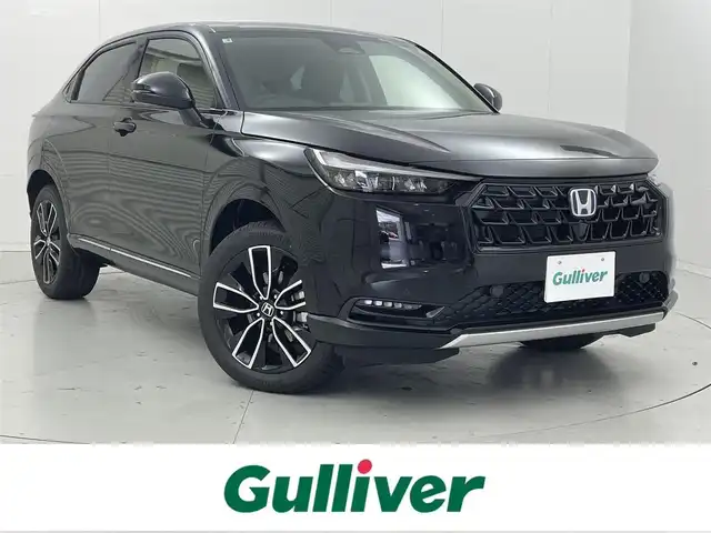 ホンダ ヴェゼル ハイブリッド e:HEV Z 茨城県 2025(令7)年 0.1千km クリスタルブラックパール Honda CONNECTディスプレイ(OP)/Bluetooth/フルセグ/radio/USB/AppleCarplay/AndroidAuto/Honda SENSING/・衝突軽減ブレーキ/・誤発進抑制/・路外逸脱抑制機能/・渋滞追従機能付アダプティブクルーズコントロール/・車線維持支援システム/・渋滞運転支援機能/・オートマチックハイビーム/BSM/ETC2.0車載器/置くだけ充電(OP)/フロントグリル　ベルリナブラック/D+N席シートヒーター/ステアリングヒーター/LEDヘッドランプ/パドルシフト