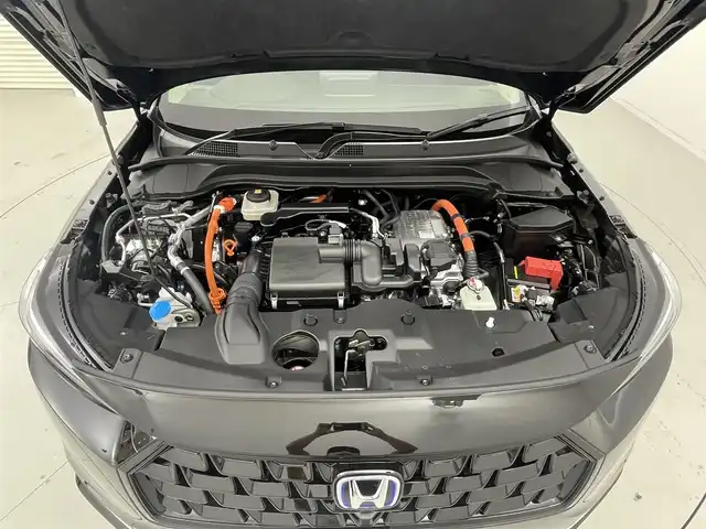 ホンダ ヴェゼル ハイブリッド e:HEV Z 茨城県 2025(令7)年 0.1千km クリスタルブラックパール Honda CONNECTディスプレイ(OP)/Bluetooth/フルセグ/radio/USB/AppleCarplay/AndroidAuto/Honda SENSING/・衝突軽減ブレーキ/・誤発進抑制/・路外逸脱抑制機能/・渋滞追従機能付アダプティブクルーズコントロール/・車線維持支援システム/・渋滞運転支援機能/・オートマチックハイビーム/BSM/ETC2.0車載器/置くだけ充電(OP)/フロントグリル　ベルリナブラック/D+N席シートヒーター/ステアリングヒーター/LEDヘッドランプ/パドルシフト