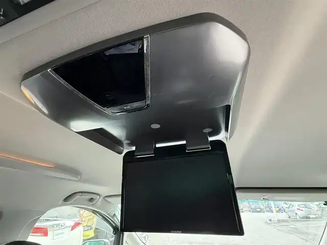 トヨタ ヴェルファイア 2．4Z プラチナセレクション 千葉県 2010(平22)年 10.7万km ホワイトパールクリスタルシャイン 社外SDナビ（AM/FM/CD/DVD/Bluetooth）/フルセグTV/バックカメラ/ETC/ALPINE製フリップダウンモニター/両側パワースライドドア/MTモード付AT/オットマン/フォグランプ/HIDヘッドライト/パワーバックドア/純正フロアマット/純正アルミホイール/スマートキー
