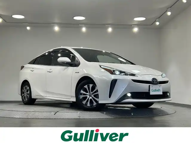 トヨタ プリウス A プレミアム 愛知県 2020(令2)年 3.8万km ホワイトパールクリスタルシャイン 純正９インチナビ/パノラミックビューモニター/アドバンストパーク/衝突軽減ブレーキ/レーダークルーズコントロール/レーンディパーチャーアラート/ブラインドスポットモニター/クリアランスソナー/ヘッドアップディスプレイ/ワイヤレス充電/レザーシート/パワーシート/シートヒーター/シートクーラー/AC100V 1500W/ドライブレコーダー/ビルトインＥＴＣ２．０/アクセサリーソケット/ISOFIX/LEDヘッドライト/純正フロアマット/純正15インチアルミホイール