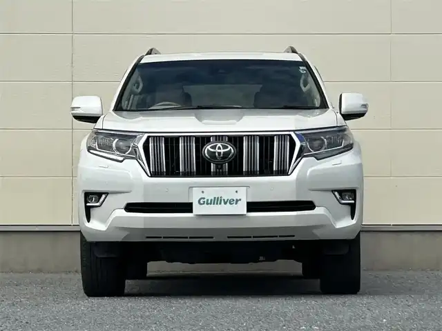 トヨタ ランドクルーザー プラド TX Lパッケージ 茨城県 2022(令4)年 3.5万km ホワイトパールクリスタルシャイン 純正ナビ/Bluetooth接続/全方位カメラ/サンルーフ/クルーズコントロール/電動リアゲート/パワーシート/シートヒーター/ビルトインETC/ベージュ革シート/USB入力端子/LEDヘッドライト/３列シート/純正アルミホイール/純正フロアマット