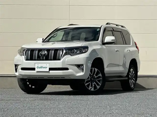 トヨタ ランドクルーザー プラド TX Lパッケージ 茨城県 2022(令4)年 3.5万km ホワイトパールクリスタルシャイン 純正ナビ/Bluetooth接続/全方位カメラ/サンルーフ/クルーズコントロール/電動リアゲート/パワーシート/シートヒーター/ビルトインETC/ベージュ革シート/USB入力端子/LEDヘッドライト/３列シート/純正アルミホイール/純正フロアマット