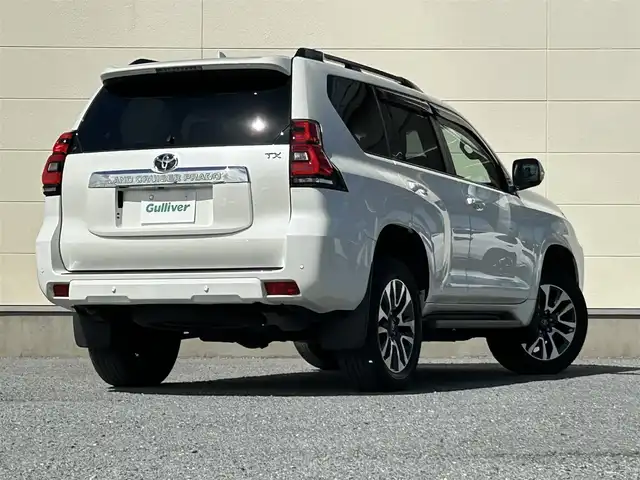 トヨタ ランドクルーザー プラド TX Lパッケージ 茨城県 2022(令4)年 3.5万km ホワイトパールクリスタルシャイン 純正ナビ/Bluetooth接続/全方位カメラ/サンルーフ/クルーズコントロール/電動リアゲート/パワーシート/シートヒーター/ビルトインETC/ベージュ革シート/USB入力端子/LEDヘッドライト/３列シート/純正アルミホイール/純正フロアマット