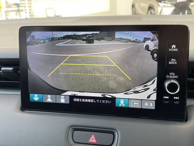 ホンダ ヴェゼル ハイブリッド e:HEV Z 愛知県 2025(令7)年 0.1千km クリスタルブラックパール 登録済未使用車/純正9型ディスプレイオーディオナビ/レーダークルーズコントロール/シートヒーター/バックカメラ/電動リアゲート/コーナーセンサー/純正アルミホイール/ETC2.0/ブラインドスポットモニター/LEDヘッドライト/パドルシフト/ステアリングヒーター/オートマチックハイビーム/ワイヤレス充電機/衝突軽減システム/フルセグ/Bluetooth/ステアリングスイッチ/スマートキー/プッシュスタート