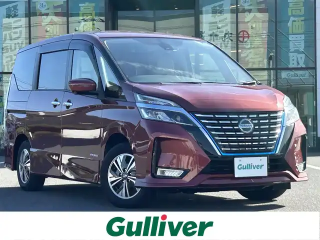 日産 セレナ e－パワー ハイウェイスター V 岡山県 2022(令4)年 2.5万km マルーンレッド 登録時走行距離24470km/純正10インチナビ/フルセグTV(AM.FM.CD.DVD.TV.BT)/フリップダウンモニター/両側パワースライドドア/全方位カメラ/ETC/ドライブレコーダー/シートヒーター/ステアリングヒーター/プロパイロット/クリアランスソナー/衝突軽減ブレーキ/横滑り防止装置/クルーズコントロール(追従走行あり)/車線逸脱警報（レーンキープアシスト）/オートライト/オートマチックハイビーム/アイドリングストップ/15インチ純正AW/純正フロアマット