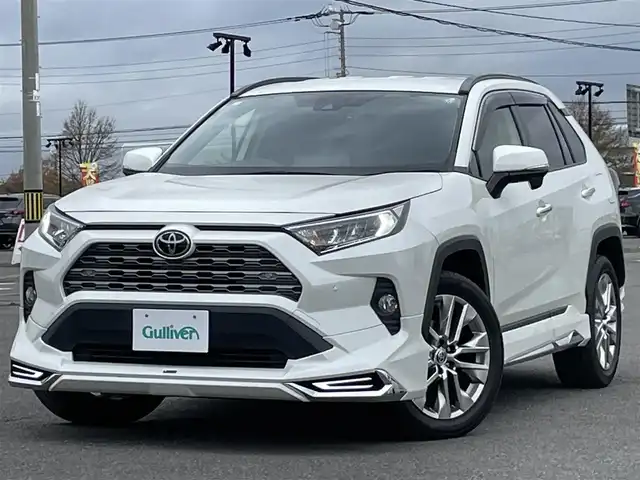 トヨタ ＲＡＶ４ G Zパッケージ 道央・札幌 2021(令3)年 7万km ホワイトパールクリスタルシャイン ４WD/モデリスタフルエアロ/ALPIN9インチナビ/CD/DVD/BT/フルセグ/トヨタセーフティセンス/プリクラッシュセーフティ/横滑り防止装置/レーダークルーズコントロール/ダウンヒルアシストコントロール/レーンキープアシスト/クリアランスソナー/ブラインドスポットモニター/パーキングサポートブレーキ/リアクロストラフィックアラート/ロードサインアシスト/バックカメラ/ビルトインETC/ドライブレコーダー/DRIVEMODE切替/デジタルインナーミラー/パワーバックドア/D席パワーシート/D席メモリーシート/前席シートヒーター/レザーシート/革巻きステアリング/ステアリングリモコン/ハンドルヒーター/電動パーキング/ブレーキホールド/MTモード付AT/プッシュスタート/スマートキー/LEDヘッドライト/オートライト/オートハイビーム/フォグランプ/電動格納ミラー/ウィンカーミラー/純正フロアマット/ドアバイザー