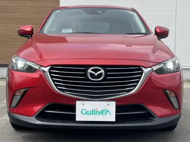 マツダ ＣＸ－３ XD ツーリング 秋田県 2015(平27)年 9.3万km ソウルレッドプレミアムメタリック 純正ナビ/衝突軽減システム/LEDヘッドライト/４WD/スマートキー/フルセグ/バックカメラ/プッシュスタート/アイドリングストップ/前席シートヒーター/クルーズコントロール/ブラインドスポットモニター/パドルシフト/MTモード付AT/社外アルミ/社外フロアマット/ステアリングスイッチ/純正エンジンスターター/ETC/オートライト/オートエアコン/パワーステアリング/パワーウィンドウ/電動格納ウィンカーミラー