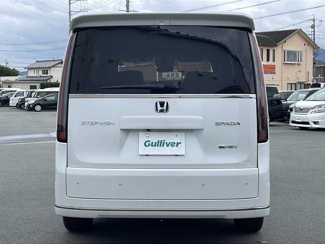 ホンダ ステップワゴン スパーダ eHEV 三重県 2025(令7)年 0.1万km未満 プラチナホワイトパール プッシュスタート/横滑り防止/両側パワースライドドア/電動リヤゲート/オートライト/オートマチックハイビーム/リアサンシェード/電動格納ミラー/レーダークルーズコントロール/パドルシフト/レーンキープアシスト/衝突軽減ブレーキ/ブラインドスポットモニター/コーナーセンサー/純正SDナビ(AM/FM/CD/DVD/TV/BT)/シートヒーター(D+N席)/ステアリングスイッチ/革巻きステアリング/電動パーキング/ウォークスルー/USB入力端子1ヶ所/タイプC入力端子5か所/LEDヘッドライト/スペアキー/ワンオーナー/取扱説明書/保証書/禁煙車