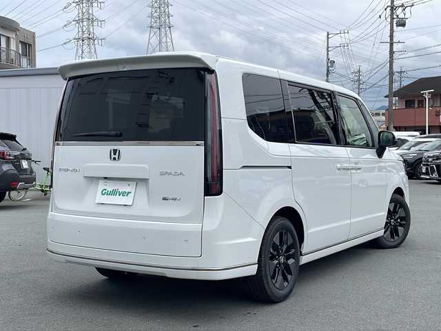 ホンダ ステップワゴン スパーダ eHEV 三重県 2025(令7)年 0.1万km未満 プラチナホワイトパール プッシュスタート/横滑り防止/両側パワースライドドア/電動リヤゲート/オートライト/オートマチックハイビーム/リアサンシェード/電動格納ミラー/レーダークルーズコントロール/パドルシフト/レーンキープアシスト/衝突軽減ブレーキ/ブラインドスポットモニター/コーナーセンサー/純正SDナビ(AM/FM/CD/DVD/TV/BT)/シートヒーター(D+N席)/ステアリングスイッチ/革巻きステアリング/電動パーキング/ウォークスルー/USB入力端子1ヶ所/タイプC入力端子5か所/LEDヘッドライト/スペアキー/ワンオーナー/取扱説明書/保証書/禁煙車