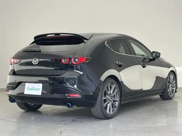 マツダ マツダ３ファストバック 20S バーガンディセレクション 愛知県 2020(令2)年 1.5万km ジェットブラックマイカ 純正ナビ　フルセグＴＶ　ＨＤＭＩ　ＤＶＤ　ＢＯＳＥサウンド　全方位カメラ　赤革　シートヒーター　衝突軽減　追従クルコン　コーナーセンサー　ＢＳＭ　ＬＥＤオートライト　ＥＴＣ　ハンドルヒーター　禁煙車