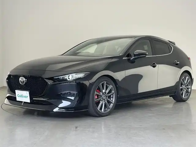 マツダ マツダ３ファストバック 20S バーガンディセレクション 愛知県 2020(令2)年 1.5万km ジェットブラックマイカ 純正ナビ　フルセグＴＶ　ＨＤＭＩ　ＤＶＤ　ＢＯＳＥサウンド　全方位カメラ　赤革　シートヒーター　衝突軽減　追従クルコン　コーナーセンサー　ＢＳＭ　ＬＥＤオートライト　ＥＴＣ　ハンドルヒーター　禁煙車