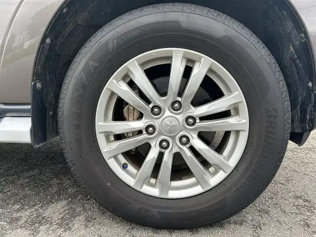 三菱 パジェロ ロング スーパーエクシード 山形県 2015(平27)年 8.2万km クォーツブラウンメタリック 4WD/サンルーフ/ロックフォードサウンドシステム/純正SDナビ/　　【CD DVD BT フルセグ USB AUX】/バックカメラ/クルーズコントロール/HIDオートヘッドライト/レザーシート/シートヒーター/パワーシート/純正18インチアルミホイール/ステアリングスイッチ/MTモード付AT/IC付ターボ/電動格納ウィンカーミラー/フォグランプ/WAC/リモコンキー×2/ETC