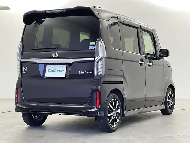 ホンダ Ｎ ＢＯＸ カスタム G L ホンダセンシング 福井県 2019(令1)年 2.7万km プレミアムベルベットパープル・パール 純正SDナビ(VXU-195VBi)/【フルセグTV/SD/CD/DVD/Bluetooth/USB】/バックカメラ/両側パワースライドドア/衝突被害軽減システム/レーダークルーズコントロール/レーンキープアシスト/純正14インチアルミホイール/オートLEDライト/オートマチックハイビーム/ビルトインETC/アイドリングストップ/横滑り防止装置/盗難防止装置/純正フロアマット/カーテンエアバッグ/プッシュスタート/スマートキー/スペアキー/取扱説明書