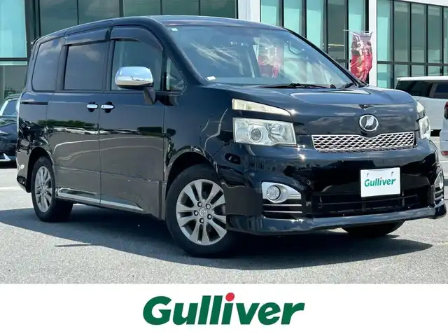 トヨタ ヴォクシー ZS 煌Ⅱ 奈良県 2012(平24)年 6.7万km ブラック 両側パワースライドドア/社外ナビ(フルセグTV/CD/DVD/AM・FM/BT/iPod)/バックカメラ/ビルトインETC/パドルシフト/HIDヘッドライト/純正16インチアルミホイール/純正フロアマット/プッシュスタート/スペアキー