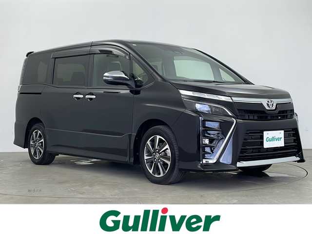 トヨタ ヴォクシー ZS 煌Ⅲ 鹿児島県 2021(令3)年 2.9万km ブラック Toyota Safety Sense/純正9型ナビ/Bluetooth DVD HDMI/フルセグTV/バックカメラ/純正12.1型フリップダウンモニター /両側電動スライドドア/ビルトインETC/レーダークルーズコントロール/前方ドライブレコーダー/前後コーナーセンサー/LEDヘッドライト/フォグライト/オートライトコントロール/レーンキープアシスト/純正16インチアルミホイール/ステアリングスイッチ/スマートキー/エンジンプッシュスタート/保証書/取扱説明書