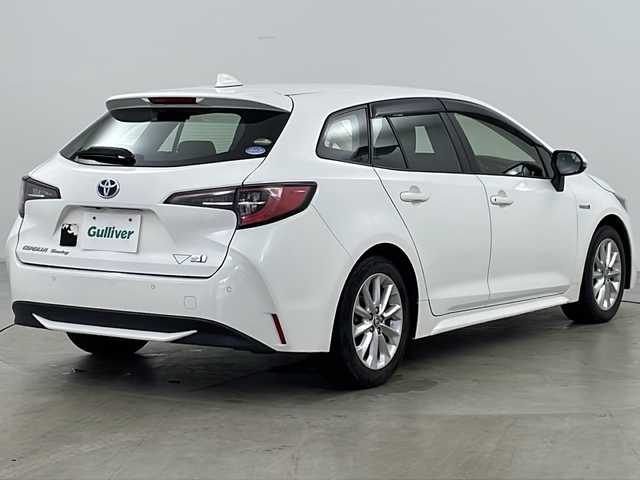 トヨタ カローラツーリング ハイブリッド G－X 道央・札幌 2020(令2)年 5.1万km スーパーホワイトⅡ ・4WD/・寒冷地仕様/・純正ナビ(BT＆USB＆Miracast)/・バックカメラ/・Toyota Safety Sense/・衝突軽減ブレーキ/・レーンキーピングアシスト/・レーダークルーズコントロール/・ロードサインアシスト/・オートマチックハイビーム/・横滑り防止/・EV MODE/・ステアリングスイッチ/・プッシュスタート/・コーナーセンサー/・社外ドライブレコーダー/・ETC/・LEDヘッドライト/・フォグランプ/・オートライト/・スマートキー/・スペアキー/・純正16インチアルミホイール/・スチール15インチスタッドレス積込
