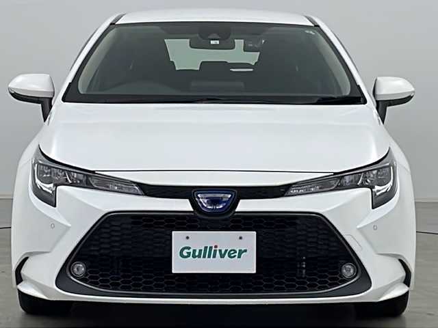 トヨタ カローラツーリング ハイブリッド G－X 道央・札幌 2020(令2)年 5.1万km スーパーホワイトⅡ ・4WD/・寒冷地仕様/・純正ナビ(BT＆USB＆Miracast)/・バックカメラ/・Toyota Safety Sense/・衝突軽減ブレーキ/・レーンキーピングアシスト/・レーダークルーズコントロール/・ロードサインアシスト/・オートマチックハイビーム/・横滑り防止/・EV MODE/・ステアリングスイッチ/・プッシュスタート/・コーナーセンサー/・社外ドライブレコーダー/・ETC/・LEDヘッドライト/・フォグランプ/・オートライト/・スマートキー/・スペアキー/・純正16インチアルミホイール/・スチール15インチスタッドレス積込