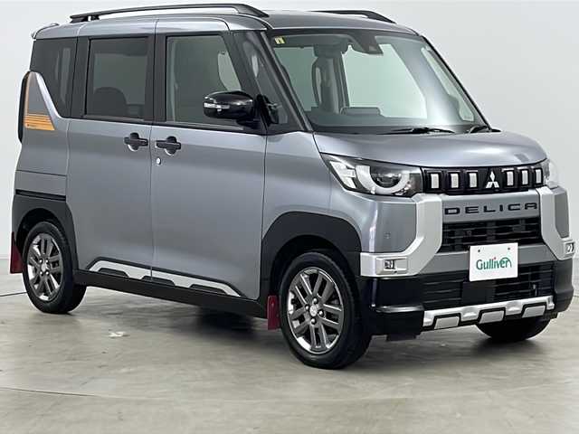 三菱 デリカミニ T プレミアム 道央・札幌 2023(令5)年 1.2万km 黒／グレー ・純正9インチナビ(TV＆BT)/・全方位カメラ/・両側パワースライドドア/・ハンズフリーオートスライドドア/・オートマチックハイビーム/・オートライト/・パドルシフト/・e-Assist/・衝突被害軽減ブレーキ/・車線逸脱警報/・MYパイロット/・踏み間違い衝突防止アシスト　/・先行車発進通知/・トラフィックサインレコグニション/・デジタルインナーミラー/・プッシュスタート/・スマートキー/・ハンドルヒーター/・ステアリングスイッチ/・ハーフレザーシート/・ビルトインETC/・シートヒーター/・ヘッドライトレベライザー/・LEDヘッドライトフォグ/・ルーフレール/・純正ゴムマット/・革巻きステアリング/・アイドリングストップ/・ダウンヒルアシストコントロール