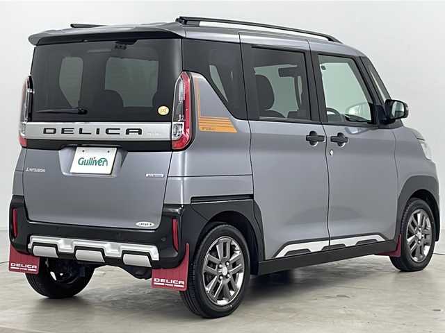 三菱 デリカミニ T プレミアム 道央・札幌 2023(令5)年 1.2万km 黒／グレー ・純正9インチナビ(TV＆BT)/・全方位カメラ/・両側パワースライドドア/・ハンズフリーオートスライドドア/・オートマチックハイビーム/・オートライト/・パドルシフト/・e-Assist/・衝突被害軽減ブレーキ/・車線逸脱警報/・MYパイロット/・踏み間違い衝突防止アシスト　/・先行車発進通知/・トラフィックサインレコグニション/・デジタルインナーミラー/・プッシュスタート/・スマートキー/・ハンドルヒーター/・ステアリングスイッチ/・ハーフレザーシート/・ビルトインETC/・シートヒーター/・ヘッドライトレベライザー/・LEDヘッドライトフォグ/・ルーフレール/・純正ゴムマット/・革巻きステアリング/・アイドリングストップ/・ダウンヒルアシストコントロール