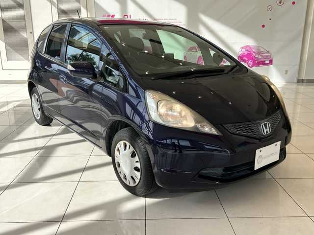 ホンダ フィット G 埼玉県 2009(平21)年 18.2万km プレミアムディープバイオレットパール ドアミラーウインカー/電動格納式リモコンカラードドアミラー/高熱線吸収/UVカット機能付プライバシーガラス/運転席ハイトアジャスター/セキュリティアラーム/アレルフリー高性能脱臭フィルター/AM/FMチューナー付きCDプレイヤー/純正ナビ/ETC