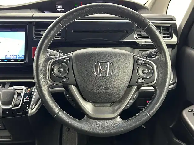ホンダ ステップワゴン スパーダ eHEV G EXホンダS 岡山県 2021(令3)年 6.3万km プラチナホワイトパール 純正9インチナビ/【Bluetooth/フルセグTV/CD/DVD/USB接続】/全方位カメラ/両側パワースライドドア/前席シートヒーター/ハーフレザーシート/レーダークルーズコントロール/衝突軽減ブレーキシステム/ビルトインETC2.0/LEDヘッドライト/フォグランプ/社外ドライブレコーダー（前後）/オートブレーキホールド/純正16インチアルミホイール/純正フロアマット/新車保証書