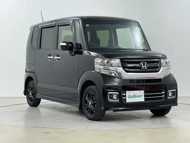 ホンダ Ｎ ＢＯＸ カスタムG SSブラックスタイル 道央・札幌 2016(平28)年 3.2万km クリスタルブラックパール ・４ＷＤ　/・社外ナビ/・BT/CD/DVD/SD/iPod/フルセグTV）　/・バックカメラ　/・両側パワースライドドア　/・運転席/助手席シートヒーター/・ＥＴＣ　/・HIDライト/オートライト　/・ヒーテッドドアミラー/・スタート/スマートキー　/・横滑り防止装置　/・ＡＢＳ　/・Ｗエアバック