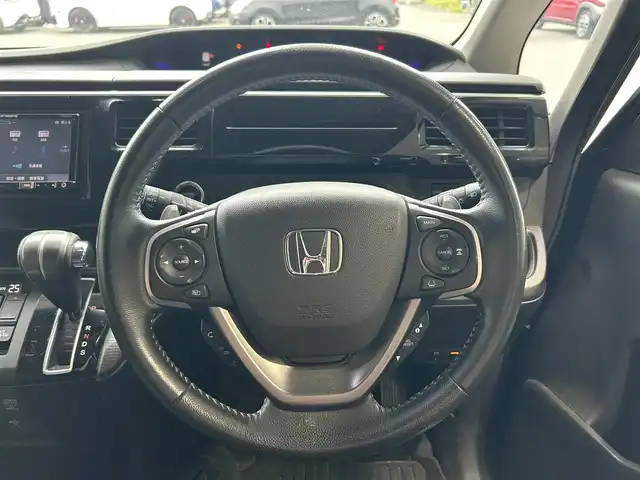 ホンダ ステップワゴン スパーダ ホンダセンシング 岐阜県 2017(平29)年 7万km プレミアムスパークルブラックパール ワンオーナー　/ホンダセンシング　/カロッツェリア製ナビ/（フルセグ・bluetooth・CD・DVD)　/ビルトインETC　/両側パワースライドドア　/ウォークスルー　/セカンドシートサンバイザー/スマートキー×2　/電格ミラー/LEDヘッドライト/保証書　/取扱説明書