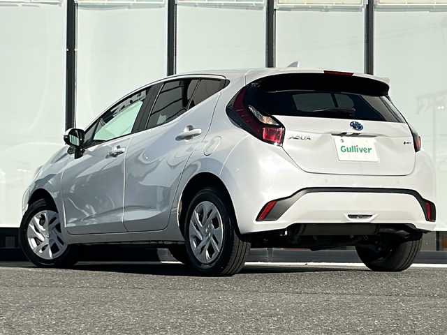 トヨタ アクア G 山形県 2024(令6)年 2.1万km プラチナホワイトパールマイカ 禁煙車/4WD/寒冷地仕様/トヨタセーフティセンス/クルーズコントロール/レーンキープアシスト/横滑り防止装置/純正ドライブレコーダー/前後コーナーセンサー/バックカメラ/オートマチックハイビーム/純正ナビ/（Bluetooth/AM/FM/USB)/nanoe/社外ETC/スマートキー/LEDヘッドライト/電動格納ミラー