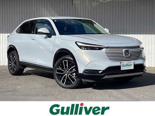 ホンダ ヴェゼル ハイブリッド e:HEV Z 長野県 2022(令4)年 3.9万km プレミアムサンライトホワイトパール 純正メーカーナビフルセグＴＶ/バックカメラ/ＥＴＣ２．０/パワーバックドア/純正18インチアルミ/ハーフレザーシート/シートヒーター/ステアリングヒーター/前後コーナーセンサー/後退出庫サポート/ワイヤレス充電器/プッシュスタート/保証書・スペアキー