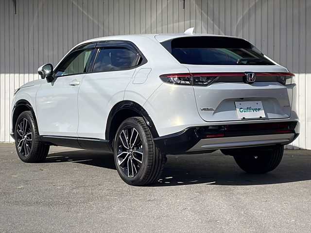 ホンダ ヴェゼル ハイブリッド e:HEV Z 長野県 2022(令4)年 3.9万km プレミアムサンライトホワイトパール 純正メーカーナビフルセグＴＶ/バックカメラ/ＥＴＣ２．０/パワーバックドア/純正18インチアルミ/ハーフレザーシート/シートヒーター/ステアリングヒーター/前後コーナーセンサー/後退出庫サポート/ワイヤレス充電器/プッシュスタート/保証書・スペアキー