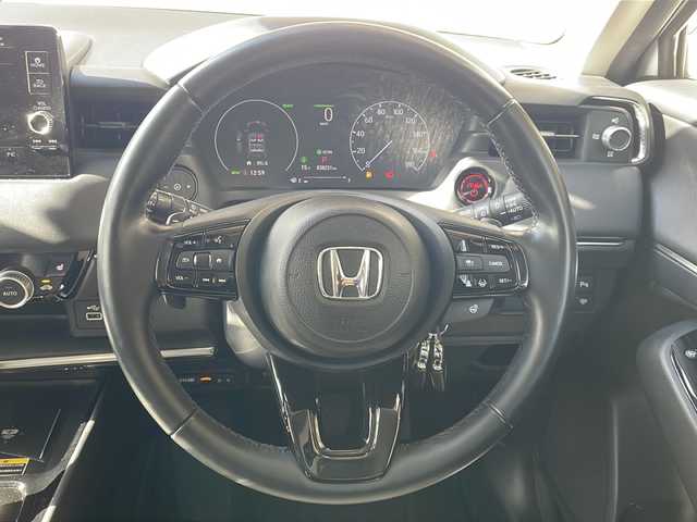 ホンダ ヴェゼル ハイブリッド e:HEV Z 長野県 2022(令4)年 3.9万km プレミアムサンライトホワイトパール 純正メーカーナビフルセグＴＶ/バックカメラ/ＥＴＣ２．０/パワーバックドア/純正18インチアルミ/ハーフレザーシート/シートヒーター/ステアリングヒーター/前後コーナーセンサー/後退出庫サポート/ワイヤレス充電器/プッシュスタート/保証書・スペアキー