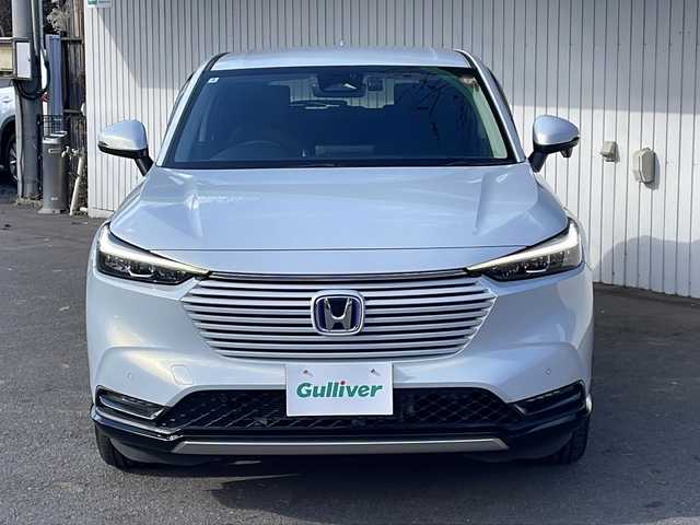 ホンダ ヴェゼル ハイブリッド e:HEV Z 長野県 2022(令4)年 3.9万km プレミアムサンライトホワイトパール 純正メーカーナビフルセグＴＶ/バックカメラ/ＥＴＣ２．０/パワーバックドア/純正18インチアルミ/ハーフレザーシート/シートヒーター/ステアリングヒーター/前後コーナーセンサー/後退出庫サポート/ワイヤレス充電器/プッシュスタート/保証書・スペアキー
