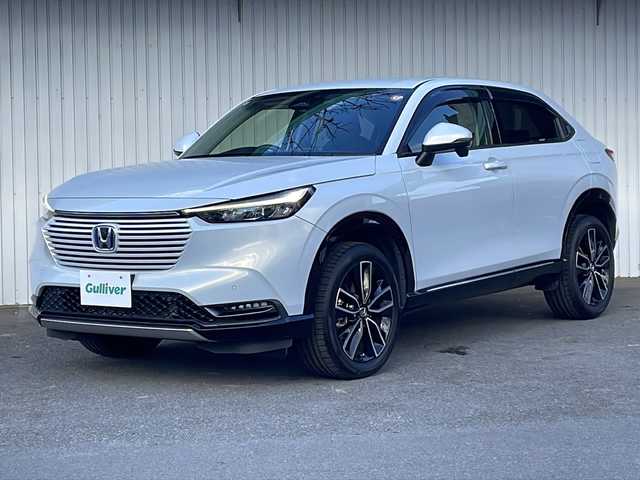 ホンダ ヴェゼル ハイブリッド e:HEV Z 長野県 2022(令4)年 3.9万km プレミアムサンライトホワイトパール 純正メーカーナビフルセグＴＶ/バックカメラ/ＥＴＣ２．０/パワーバックドア/純正18インチアルミ/ハーフレザーシート/シートヒーター/ステアリングヒーター/前後コーナーセンサー/後退出庫サポート/ワイヤレス充電器/プッシュスタート/保証書・スペアキー