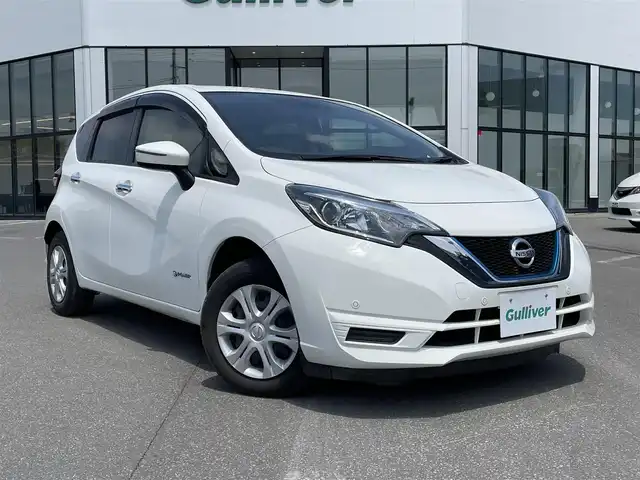 日産 ノート e－パワー B FOUR 青森県 2019(令1)年 8.2万km ホワイト ・禁煙車/・４WD/・社外SDナビ/ワンセグ/CD/AM/FM/・Bluetooth/・衝突軽減ブレーキ/・前後コーナーセンサー/・アイドリングストップ/・レーンキープアシスト/・盗難防止装置/・横滑り防止装置/・センターデフロック/・オートライト/・ETC/・社外フロアマット/・ダブルエアバック/・取扱説明書